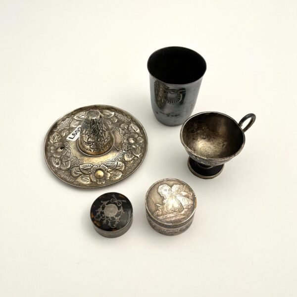 Cinco piezas en plata