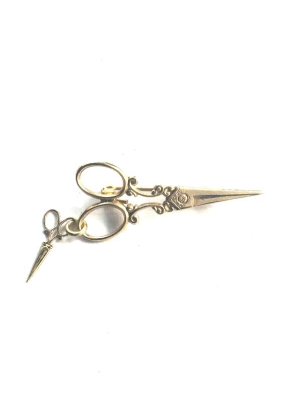 Prendedor en oro 18 K